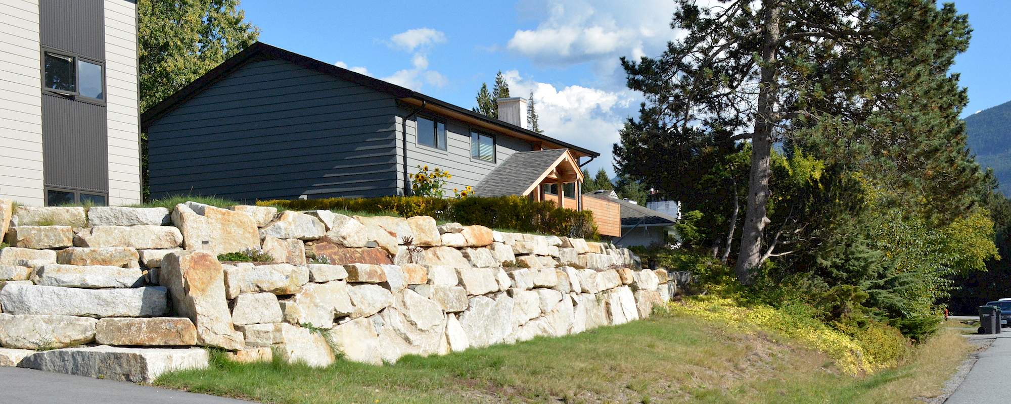 Rock retaining wall construction
