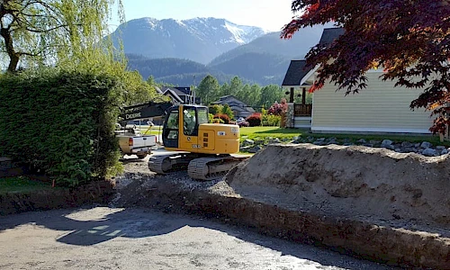 Excavator prepping a building site